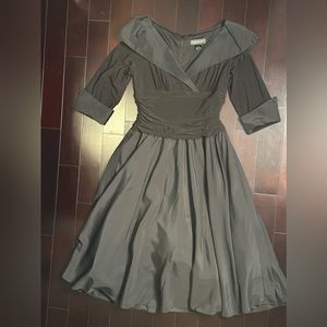 Black off shoulder knee length cocktail dress